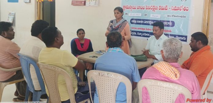 Child Protection Committee meeting in Pasara village