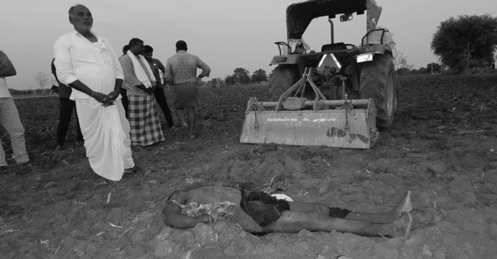 A young man died after being run over by a tractor.