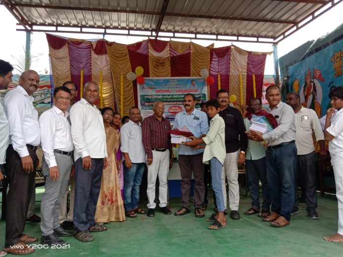 District Education Officer distributes textbooks, books, and clothing