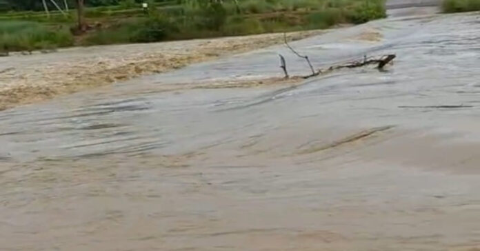 Jampanna stream overflowing at Chintal Cross..