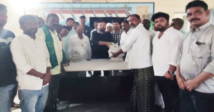 MLA Thota in the distribution of kandi seeds