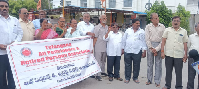 Pensioners human chain at NTR intersection..