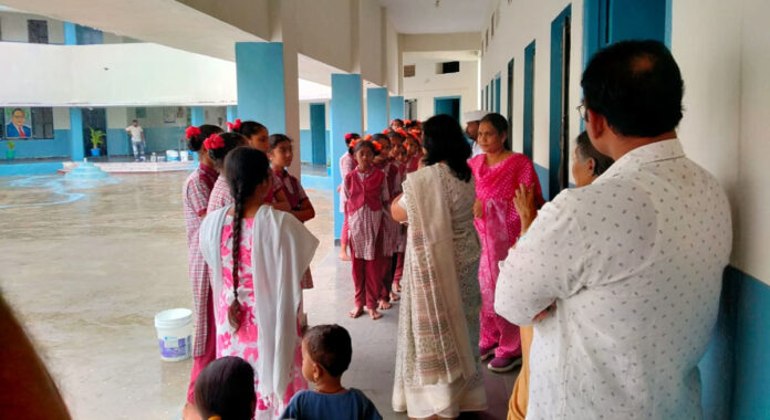 Sub-Collector inspects Kasturba School