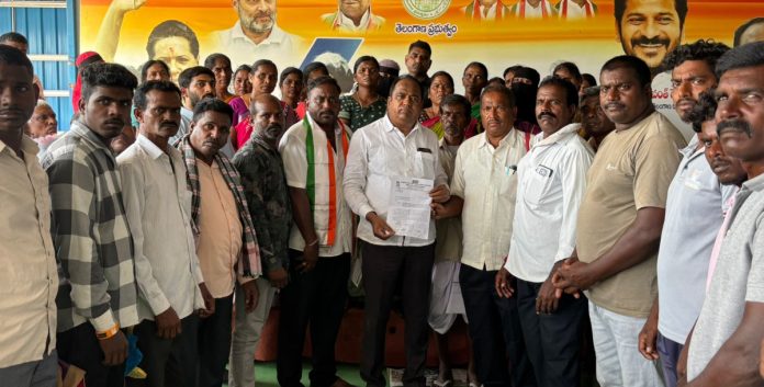 Distribution of cheques to the families of the Gulf dead..