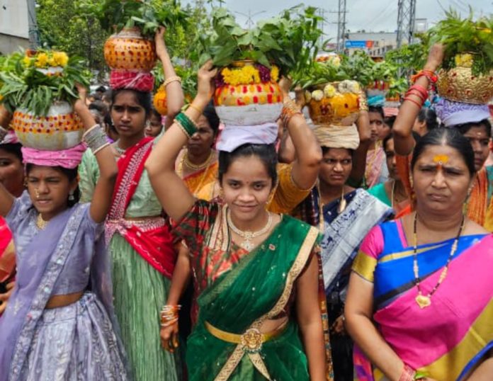 Offering of bonas to the village deities..