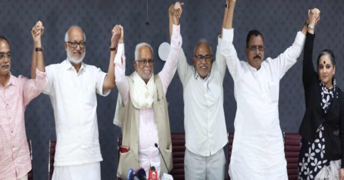 Justice B. Sudarshan Reddy meets CPI(M) General Secretary