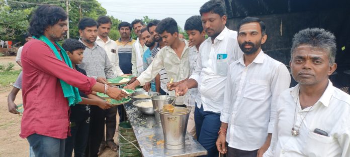 Distribution of food grains under the auspices of Balaganapathi..