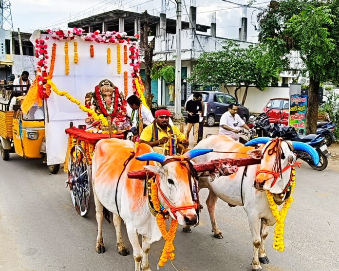 Ganesha immersion on a bullock cart