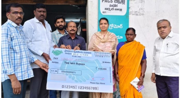 Bhima checks distributed to the victim's family..