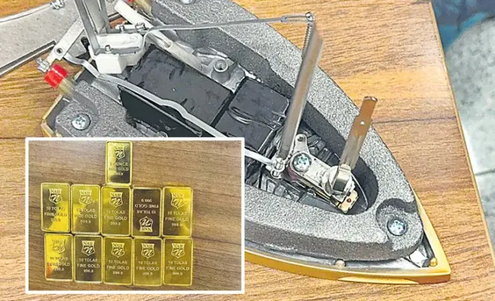 ఇస్త్రీపెట్టెలో బంగారం అక్రమ రవాణా