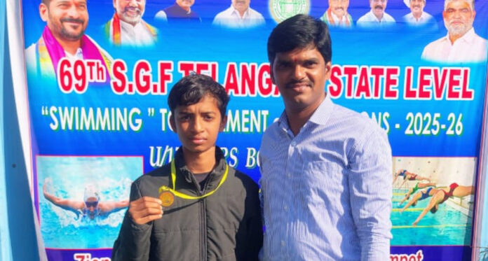 Adilabad resident Kombmu Charan Tej shows off his swimming skills