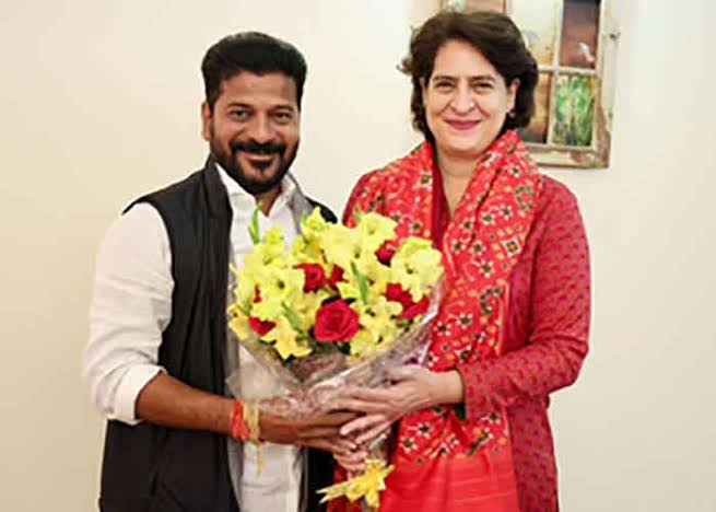 సోనియా, రాహుల్, ప్రియాంకా గాంధీలకు కలిసిన రేవంత్ రెడ్డి