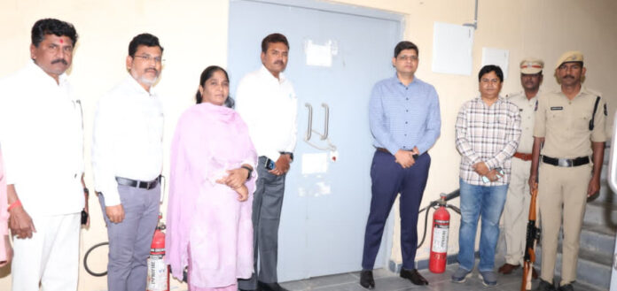 Collector inspects EVM warehouse