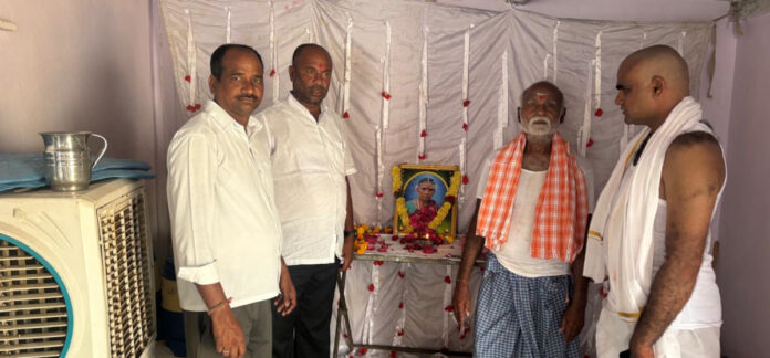 Former PACS Chairman Mondayya consults with Panchayat Secretary