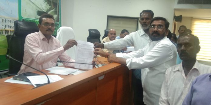 భవన నిర్మాణ కార్మిక చట్టాలను పునరుద్ధరించాలి
