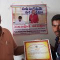 pila-ramakrishna-receiving-the-certificate-of-appreciation