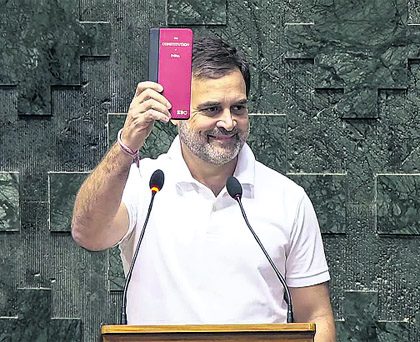 Red book in Rahul's hand