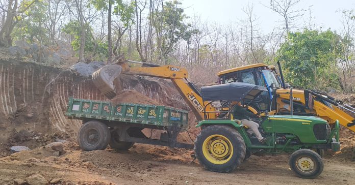 Digging up the mound...illegal removal of debris