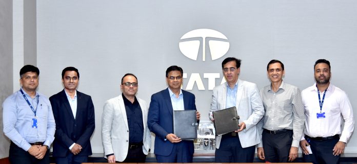 Mr. Girish Wagh, Executive Director, Tata Motors and Mr. Sandeep Gambhir, CEO, Vertelo, at the MoU signing ceremony, joined by delegates from Tata Motors and Vertelo(1)