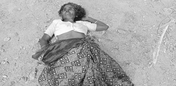 Unidentified woman's body found on the side of the road