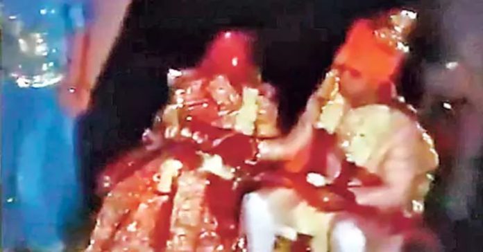 Wedding in the light of cell phone lights..