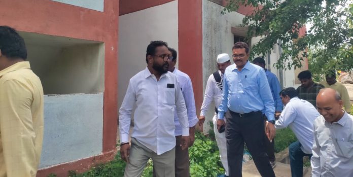 Additional Collector inspects double bedroom houses