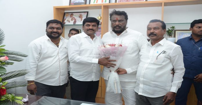 Bolliswamy meets Minister Adluri Lakshman
