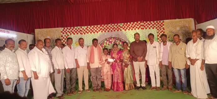 Busireddy Pandana blesses the children