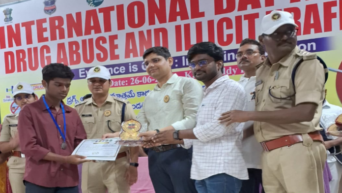 Collector presents a gift to a Gurukul College student