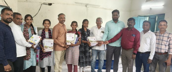 Distributing books to government school students