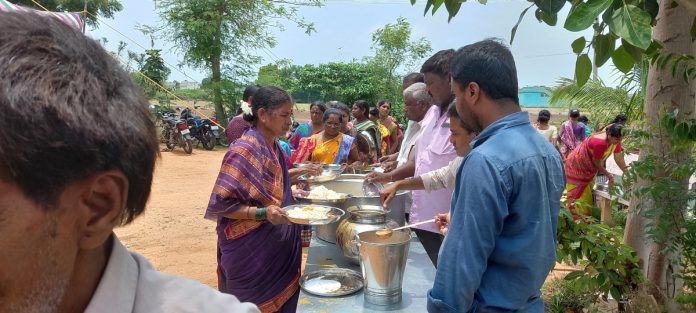 Food distribution on the occasion of the full moon of Eruvaka