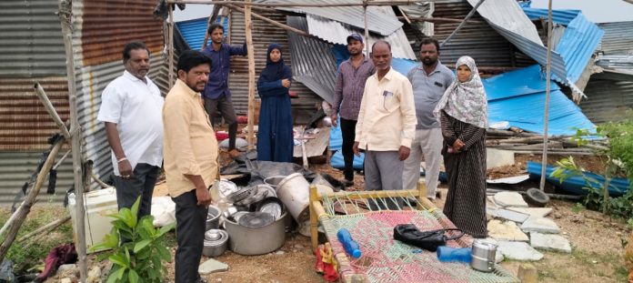 Houses damaged by wind and rain.. Consultation