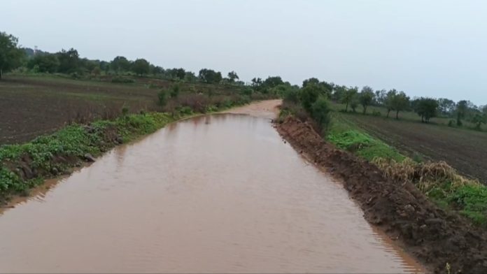 Peddagulla Road flooded with rainwater