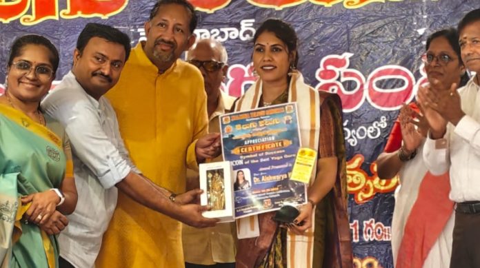 Rare award for district yoga expert in Malaysia