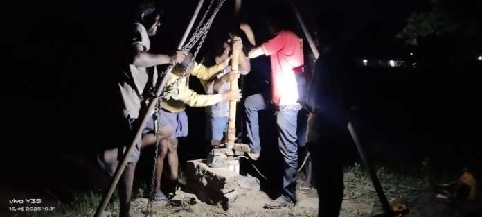 A farmer who works hard at night to harvest his crop
