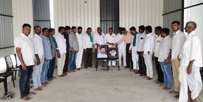 CM Revanth and MLA Thotas portraits are anointed with milk