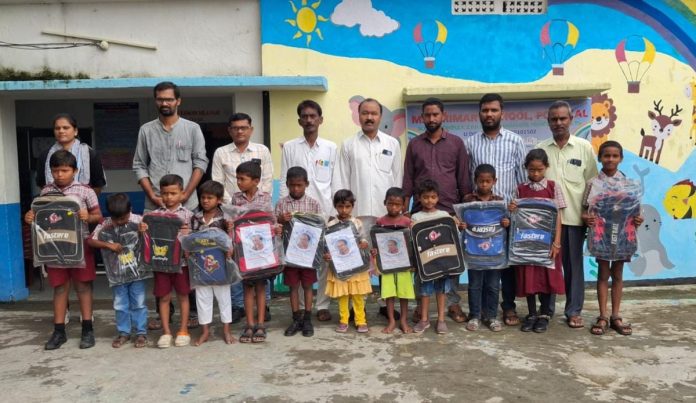 Distribution of bags to students under the auspices of PCR Foundation