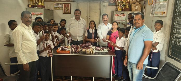 Distribution of tie belts to students