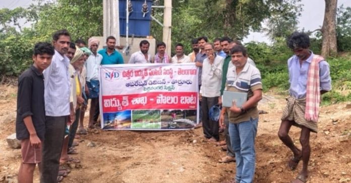 Electricity officials farm path..