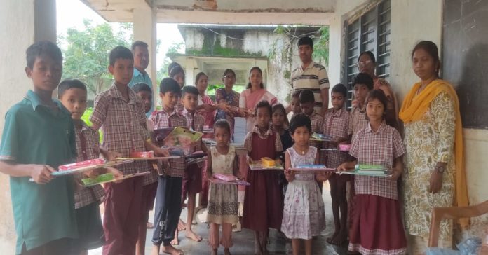 Notebooks distributed to students in Kamaram