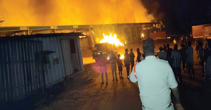 A huge fire in the ITC company stock yard