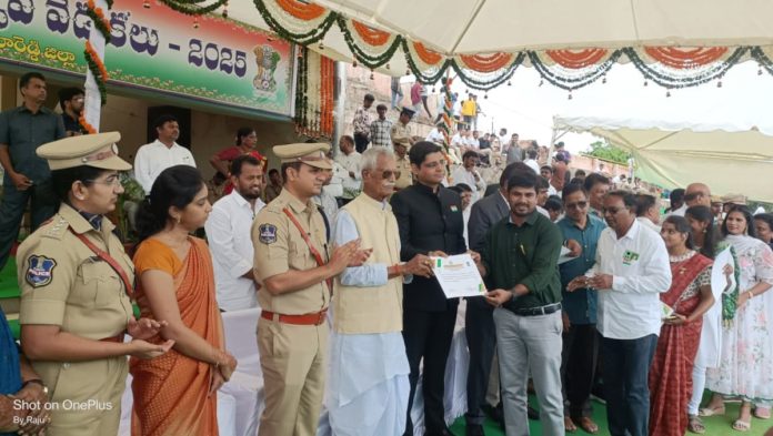 AO Raju receives award from the hands of the Collector