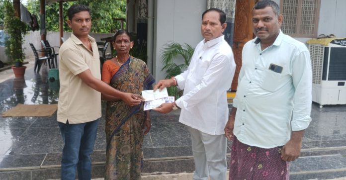 Chief Minister presents relief check..