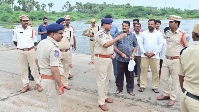 Commissioner inspects closed canal level bridges..