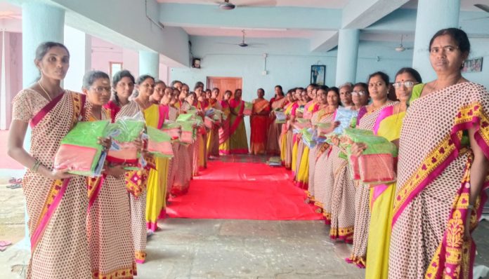 Distribution of sarees to Anganwadi staff