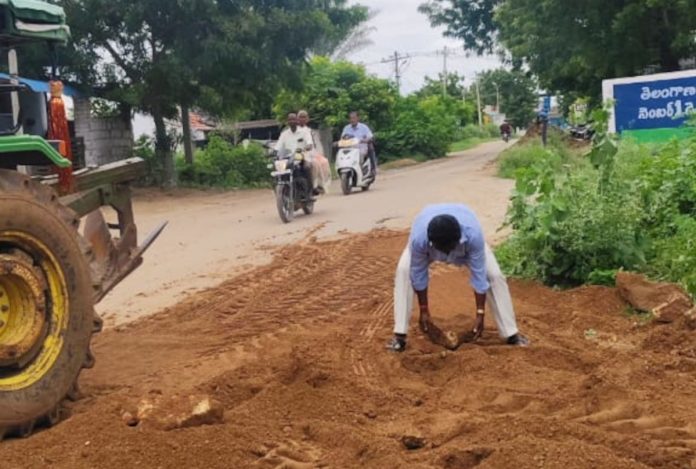 Former sarpanch who filled potholes on the road..