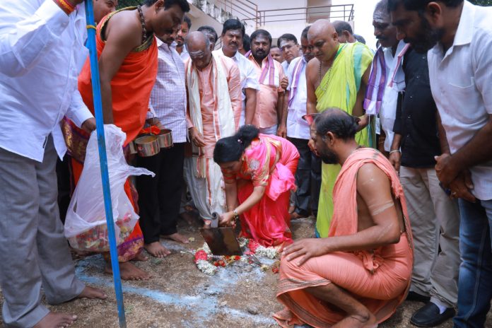 Jhansi Reddy couple perform Bhoomi Puja for construction of rest rooms