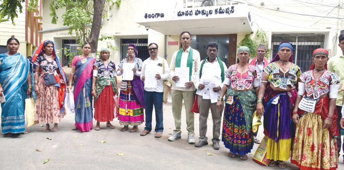 పోడు గిరిజనులపై అక్రమ కేసులు