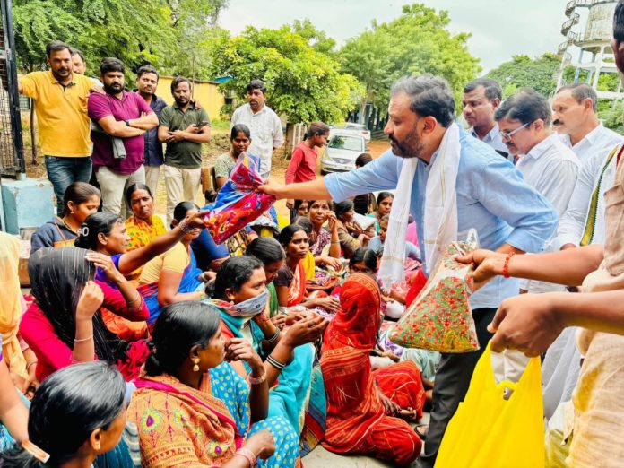 MLA Thota distributes sarees to flood-affected women