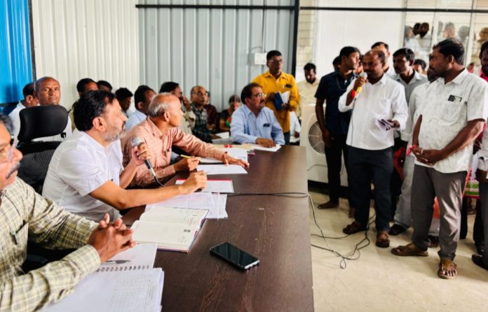 MLA review with officials at camp office..